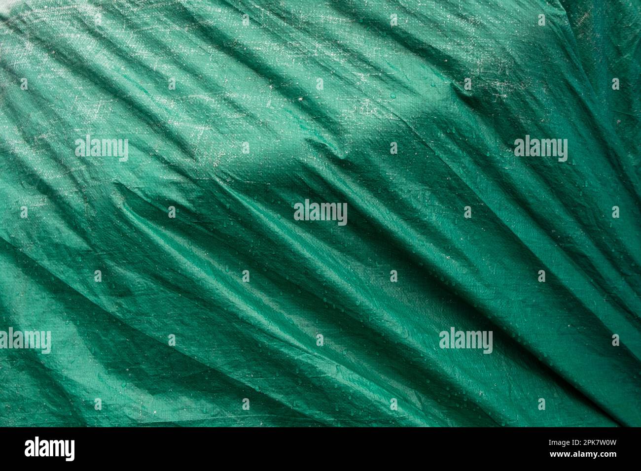 Close up of a tarpaulin cover with folds. Stock Photo