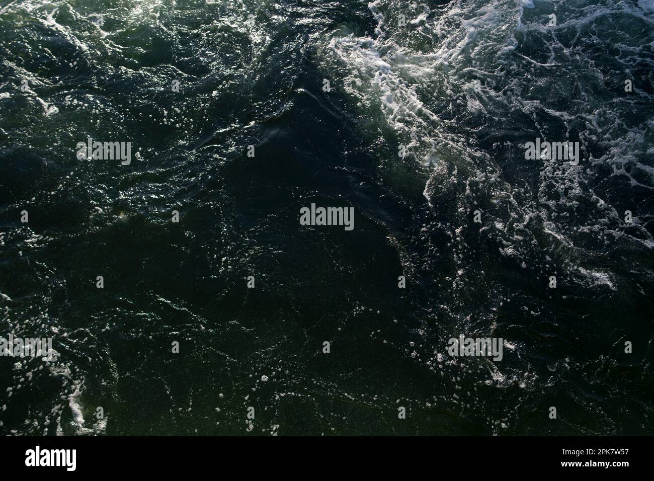 Churning ocean water, overhead view, foam and waves Stock Photo - Alamy