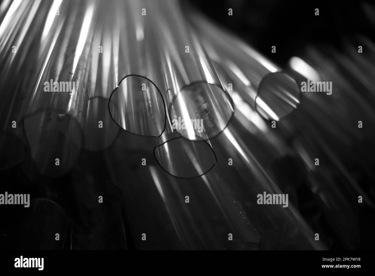 Black and white shot of broken glass tubes Stock Photo Alamy