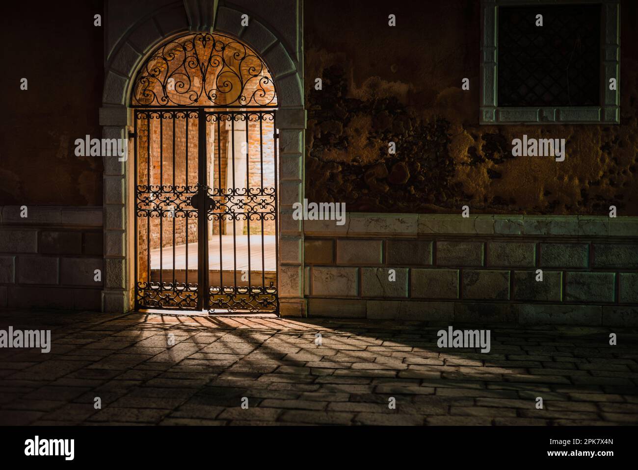 Wrought iron gate night hi-res stock photography and images - Alamy