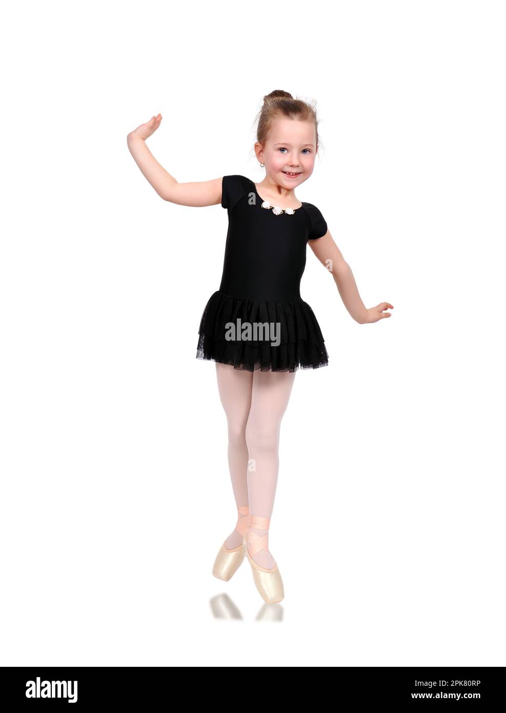 Little smiling ballerina in pointe Stock Photo