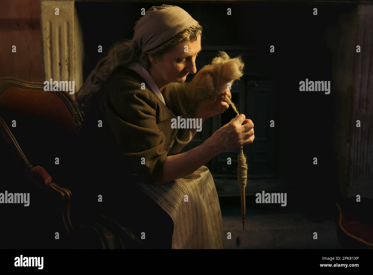 Woman Using Drop Spindle Drop spindle hi-res stock photography and images - Alamy