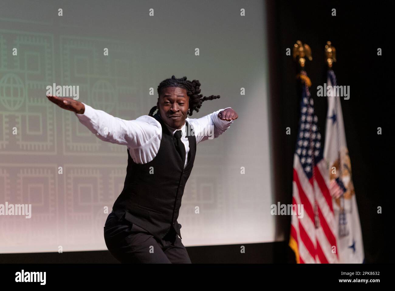 A member of Step Afrika! performs during an event with Jessica Nabongo, author and world traveler, Kevin Young, director of the National Museum of African American History and Culture (NMAAHC), in conversation with US Vice President Kamala Harris during an event at the NMAAHC in Washington, DC, US, on Wednesday, April 5, 2023. Harris's recent trip to Africa, at turns eliciting deep reflection from the historic US vice president, offered a chance for her to reconnect with Black Americans whose support is crucial for her and President Biden's looming reelection bid. Photographer: Cheriss May/Poo Stock Photo