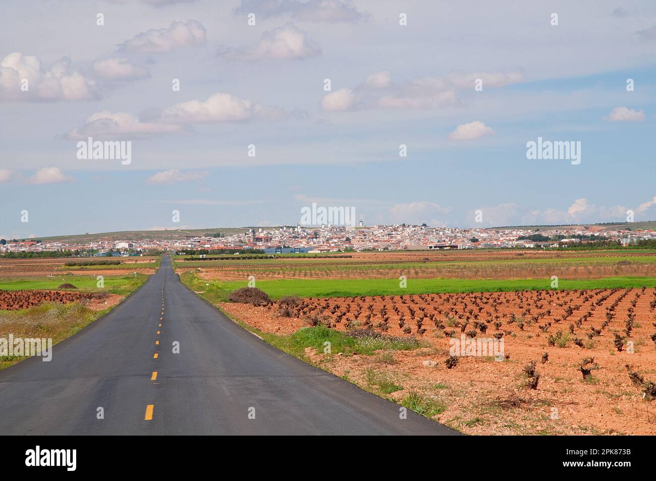Overview and road. Campo de Criptana, Ciudad Real province, Castilla La Mancha, Spain. Stock Photo