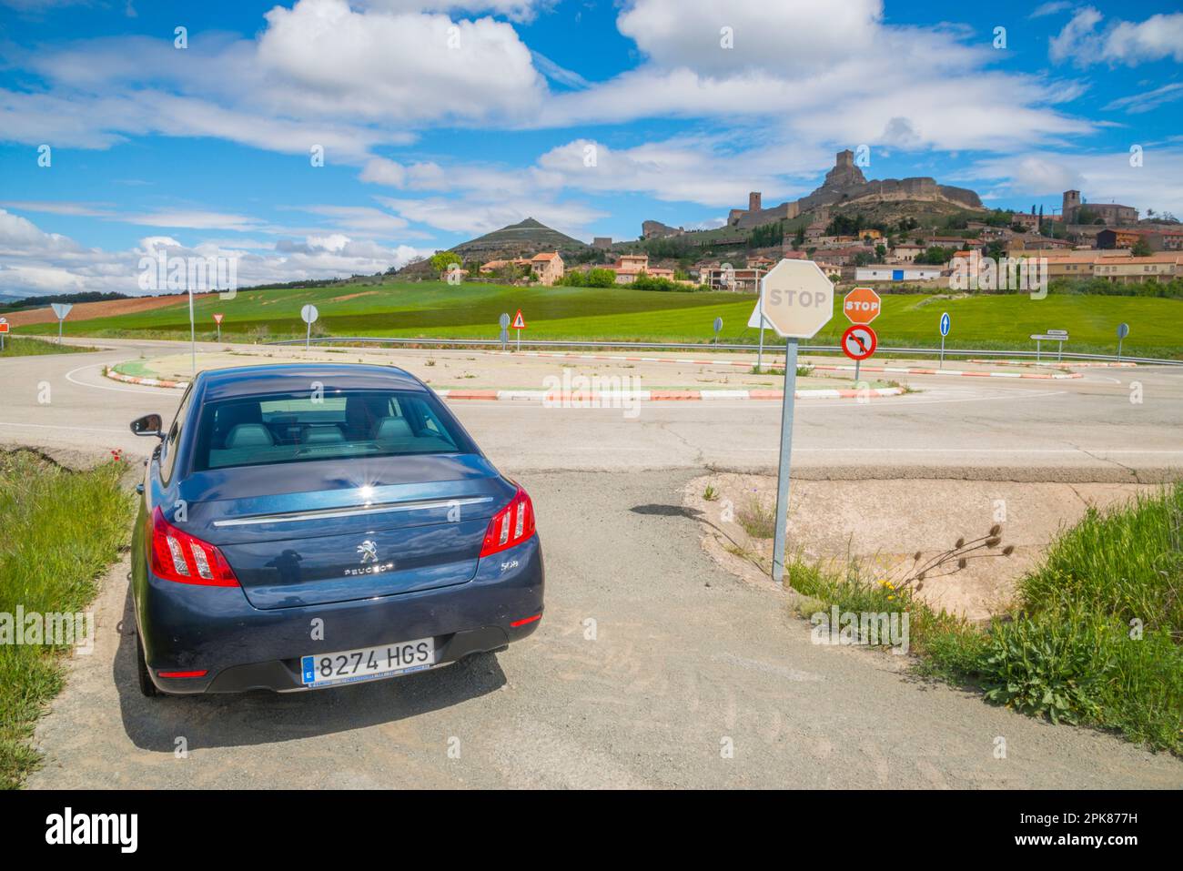Car in a side road and view of Atienza. Stock Photo