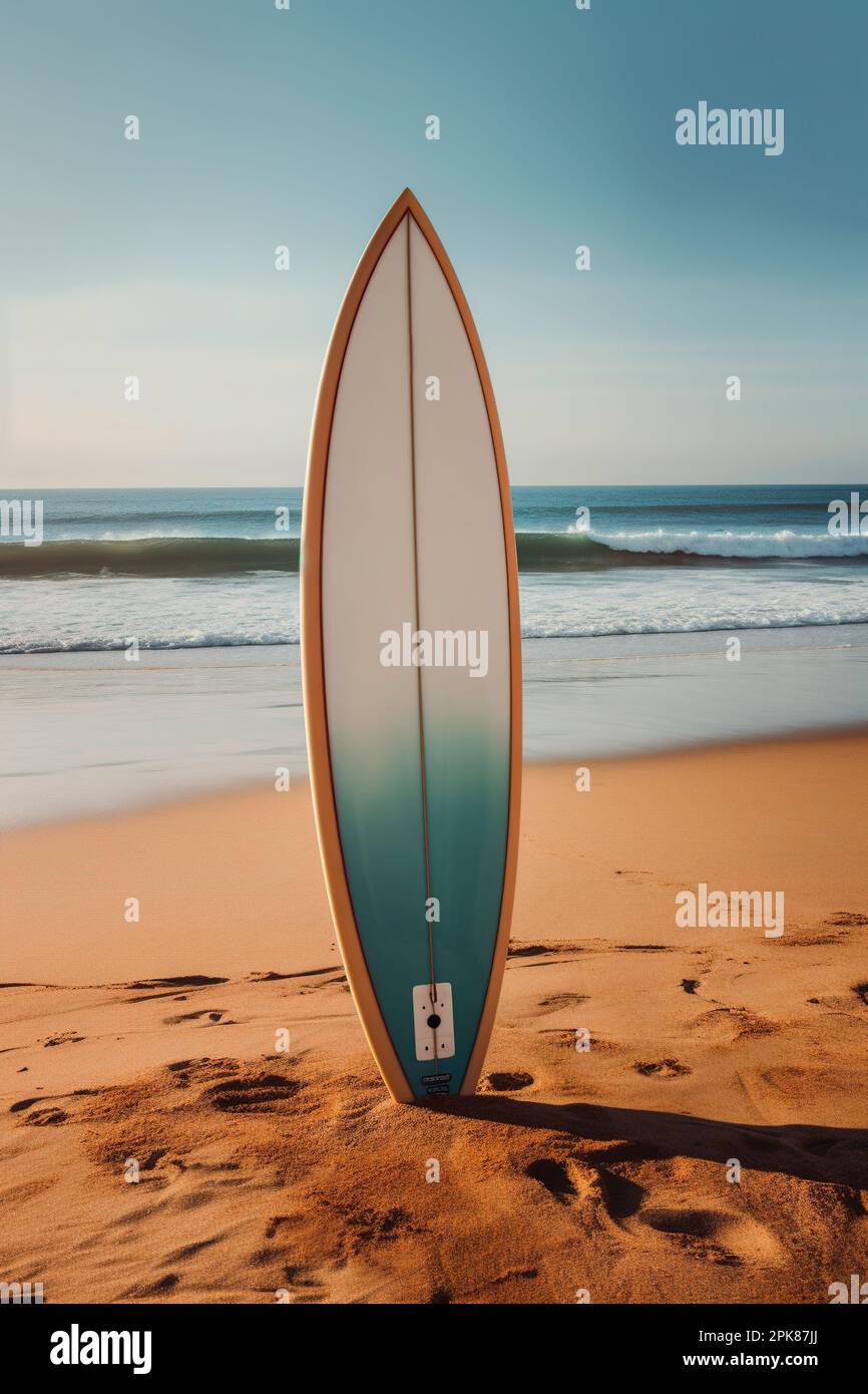 surfboard stuck in the beach sand Stock Photo Alamy