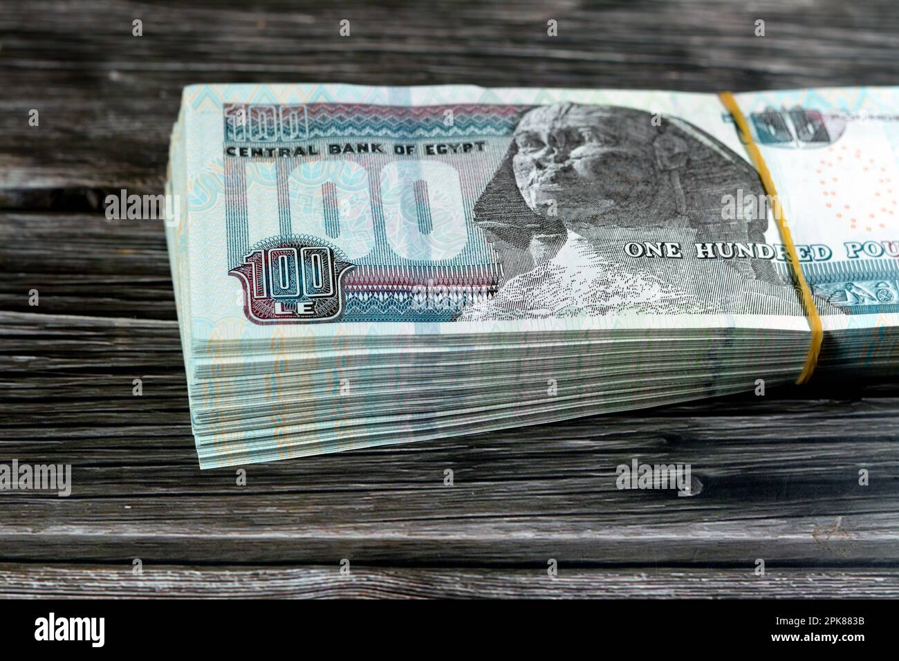 Stack of Egyptian currency of 100 EGP LE one hundred Egyptian pound