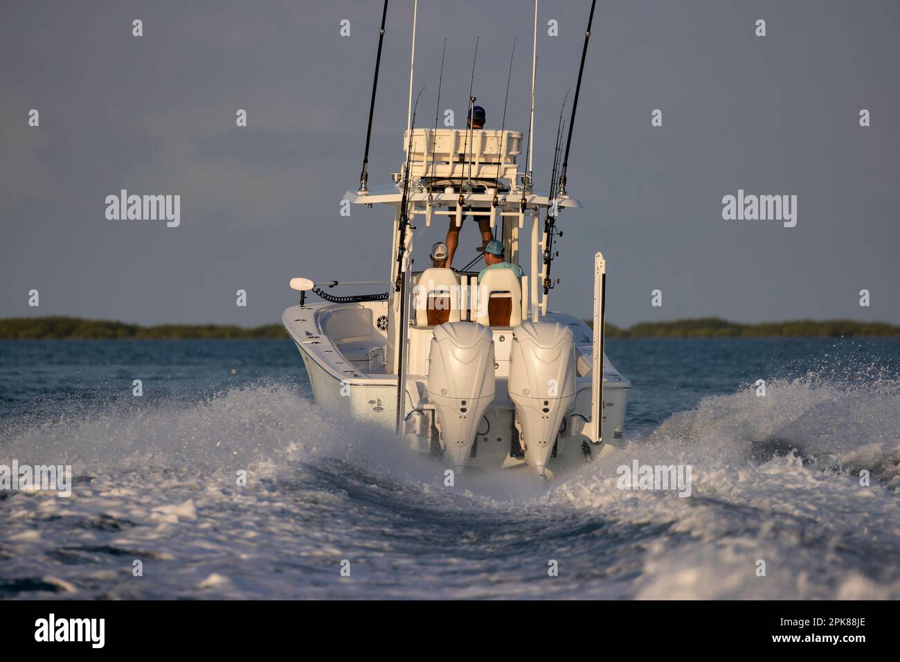 Center console fishing boat speeding away Stock Photo