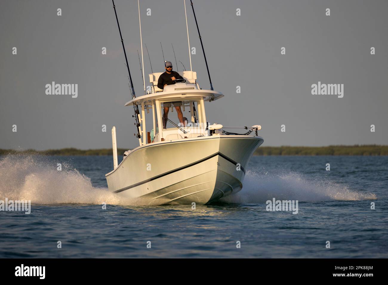 An approaching center console fishing boat Stock Photo - Alamy