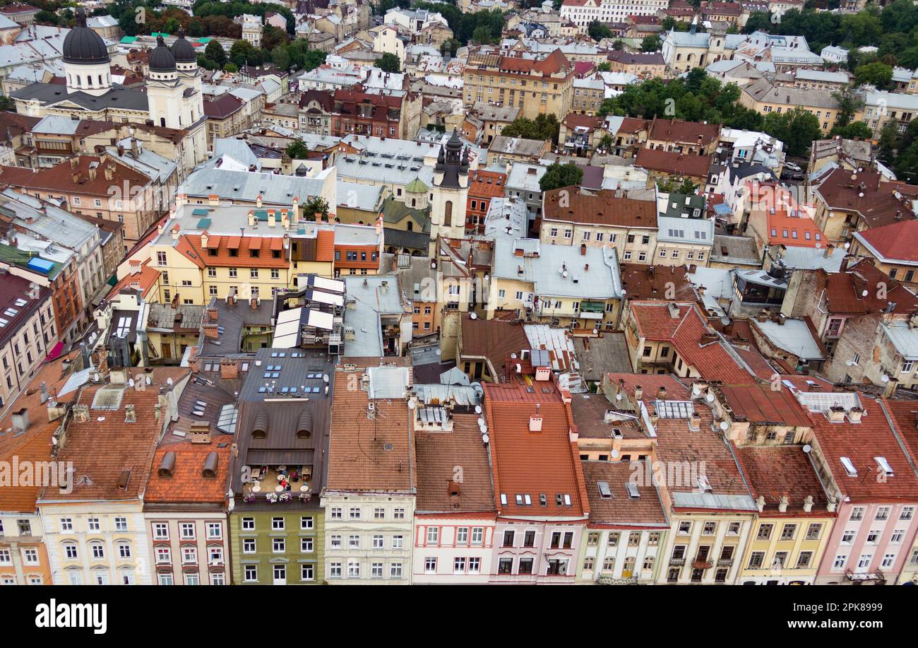 View of the old city from above. Bright vintage roofs and streets. Beautiful shot of the city of Lviv for a travel booklet and postcard Stock Photo