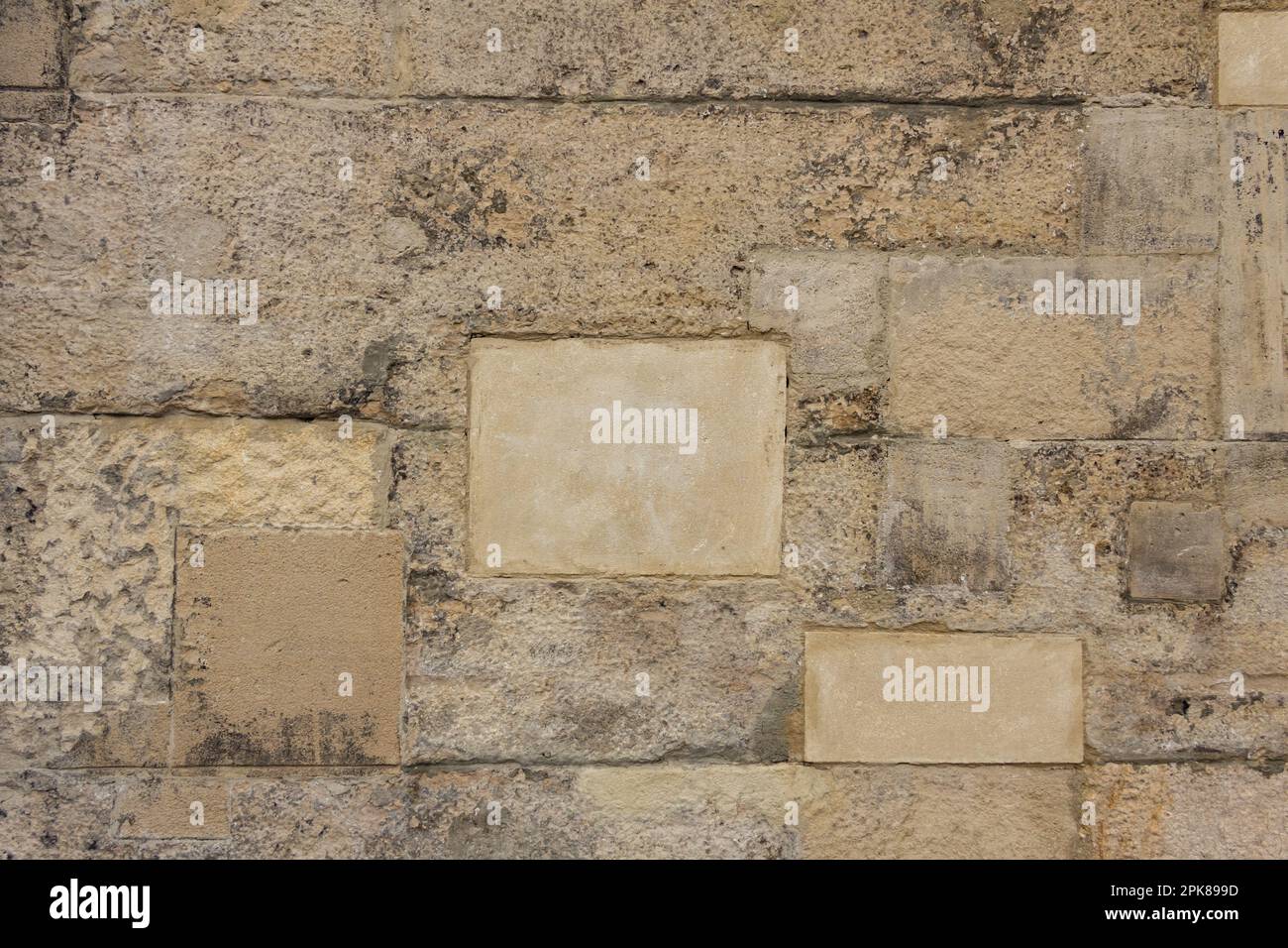The texture of the stone wall of the ancient city. Nice light beige tones. Great background for web design Stock Photo
