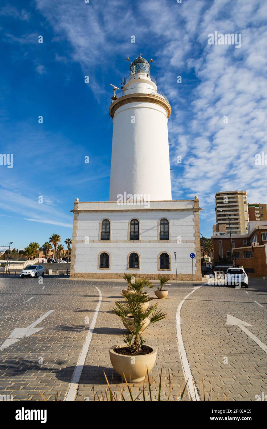 La Farola de Malaga, Malaga lighthouse on the Muelle Uno promenade. Paeso de Levante. Malaga, Andalusia, Costa del Sol, Spain. Harbour lamp white towe Stock Photo