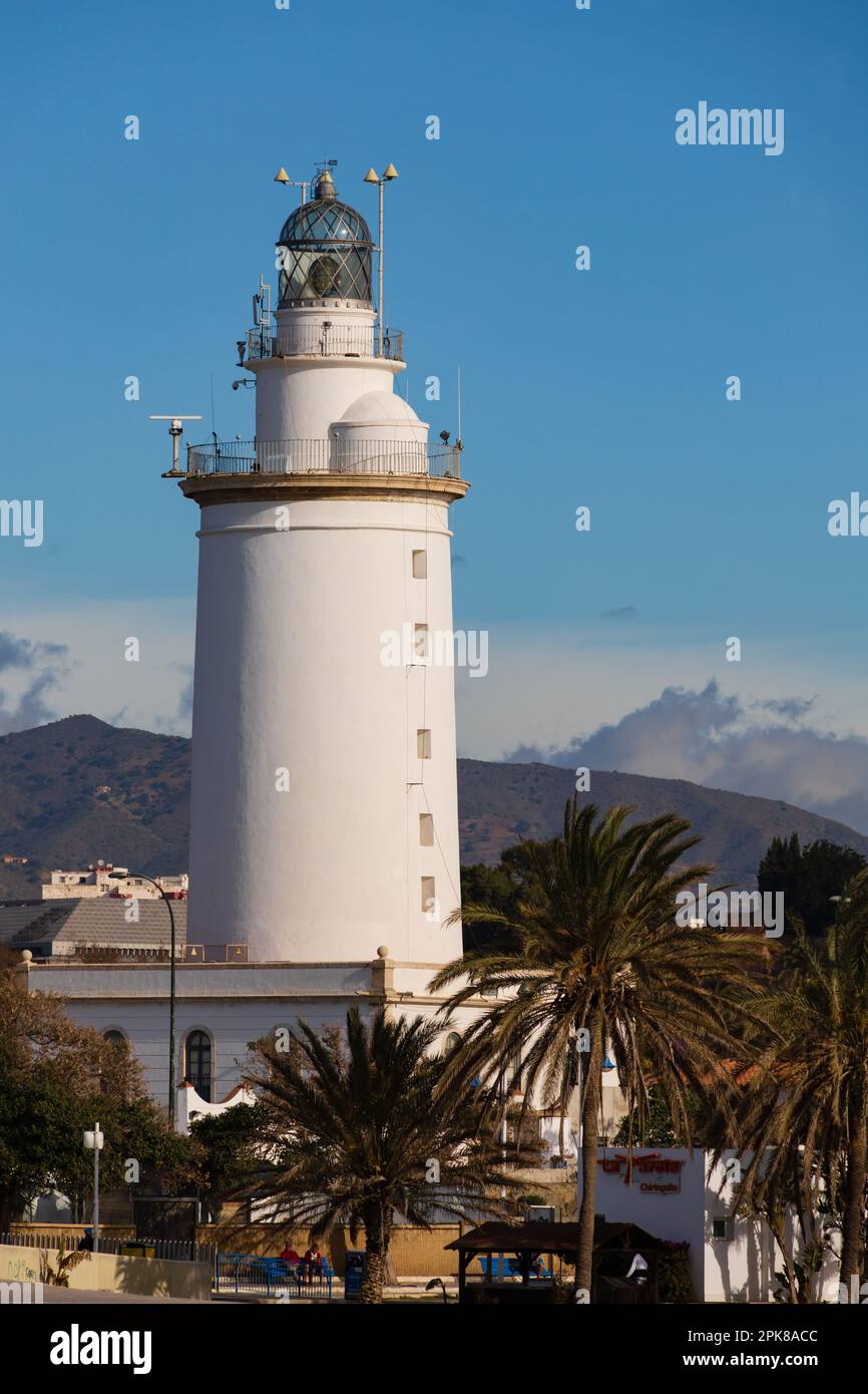 La Farola de Malaga, Malaga lighthouse on the Muelle Uno promenade. Paeso de Levante. Malaga, Andalusia, Costa del Sol, Spain. Harbour lamp white towe Stock Photo