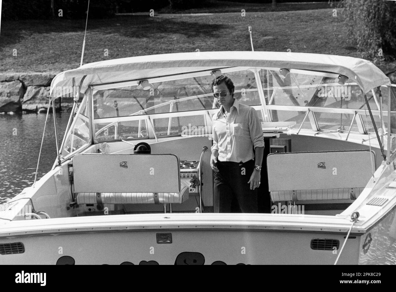 Swedish KING CARL XVI GUSTAF on board his motor boat and cleaning for summer Stock Photo
