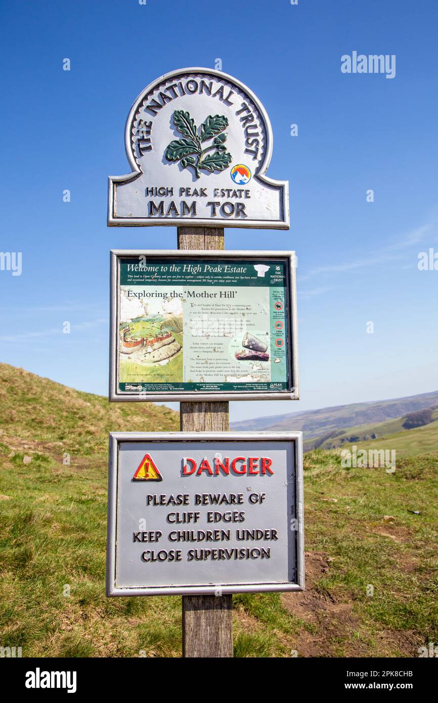 National Trust Sign post marking the start of the walk along the great ridge to Mam Tor high above the Derbyshire village of Castleton England Stock Photo