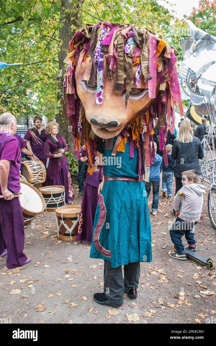 Assembling and preparing participants  ready to start the procession through the streets of Skipton at the International Puppet Festival 2015 . Stock Photo