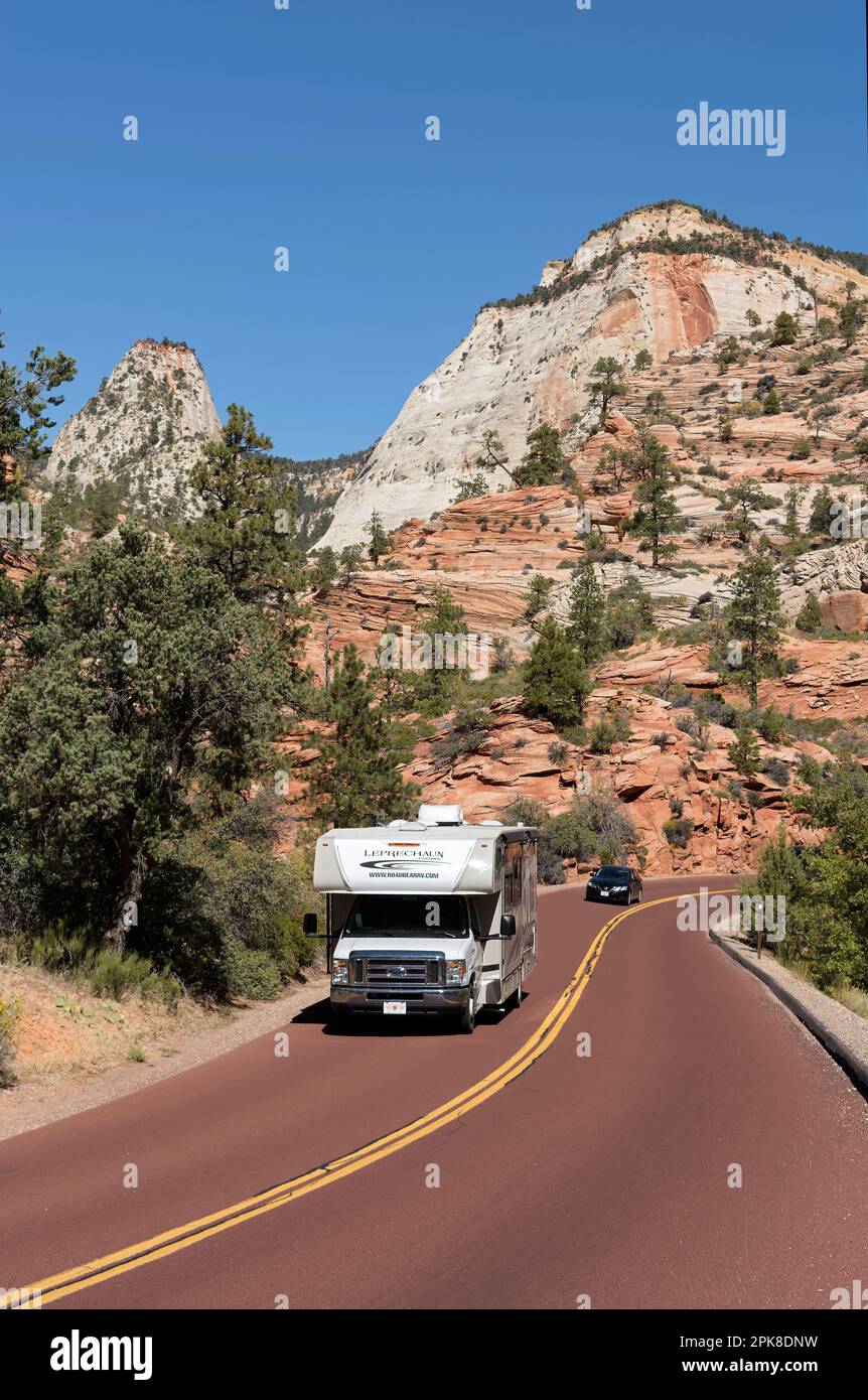 rental motorhome driving on winding scenic road ZionMountCarmel