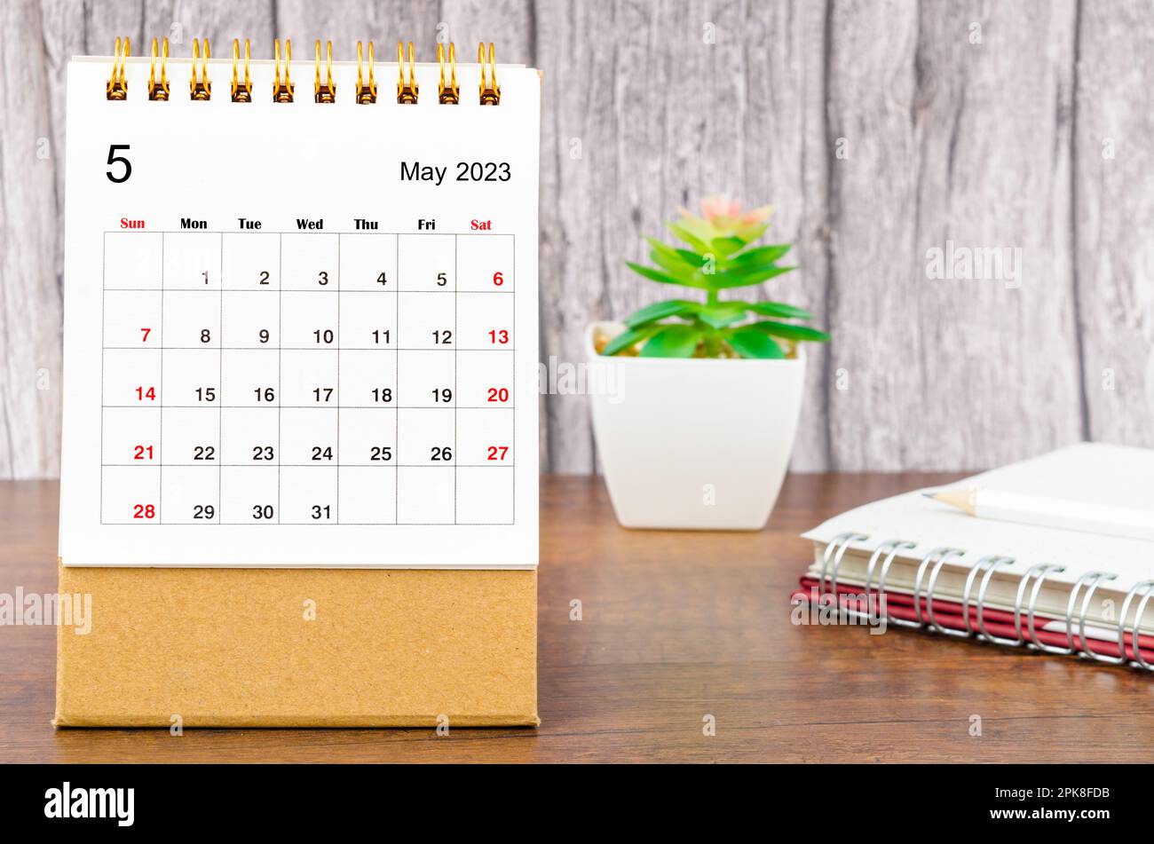 May 2023 Monthly desk calendar for 2023 year with pencil and diary Stock  Photo - Alamy
