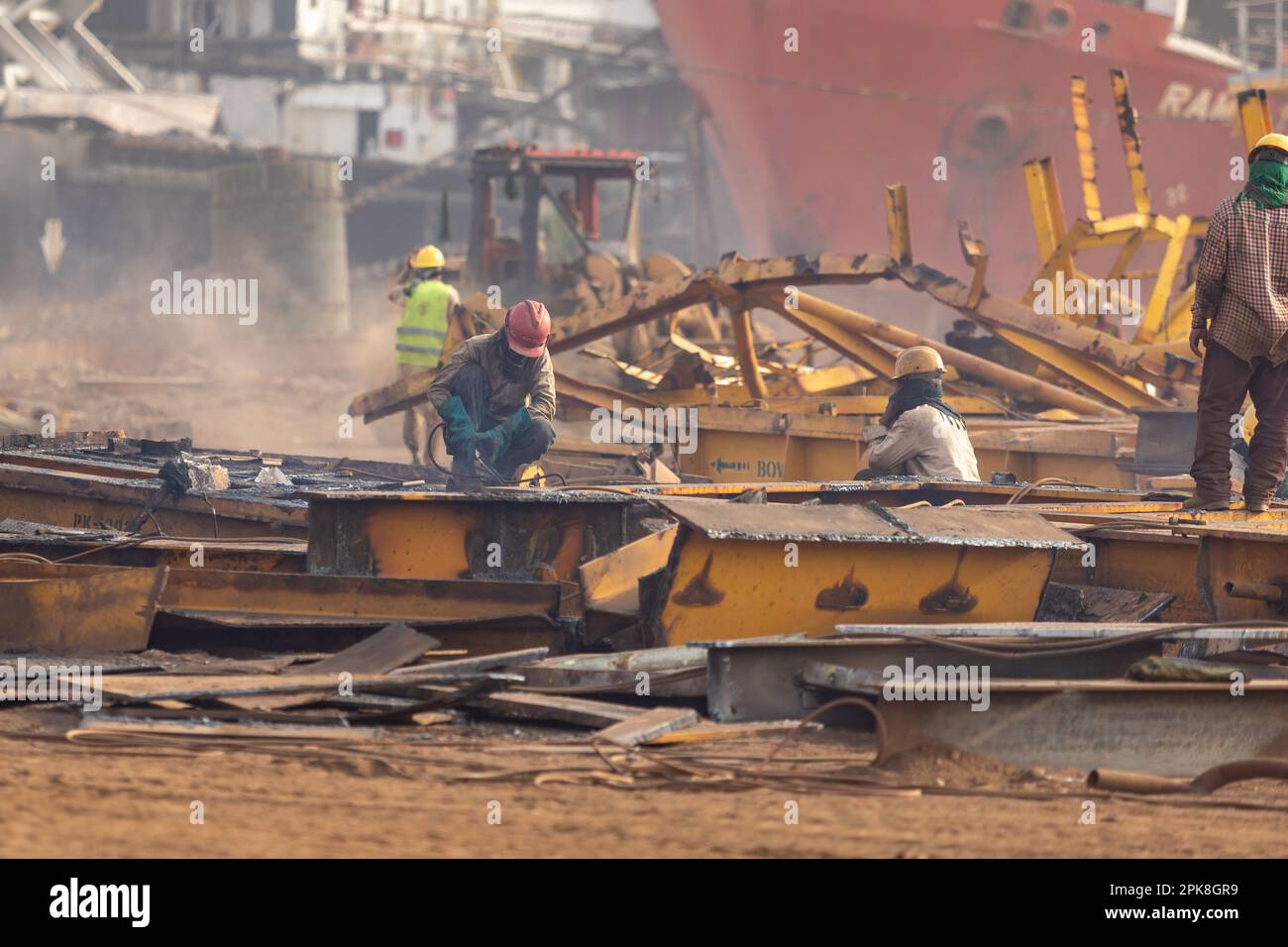 Gadani Pakistan August 2021, a worker wearing red safety helmet working