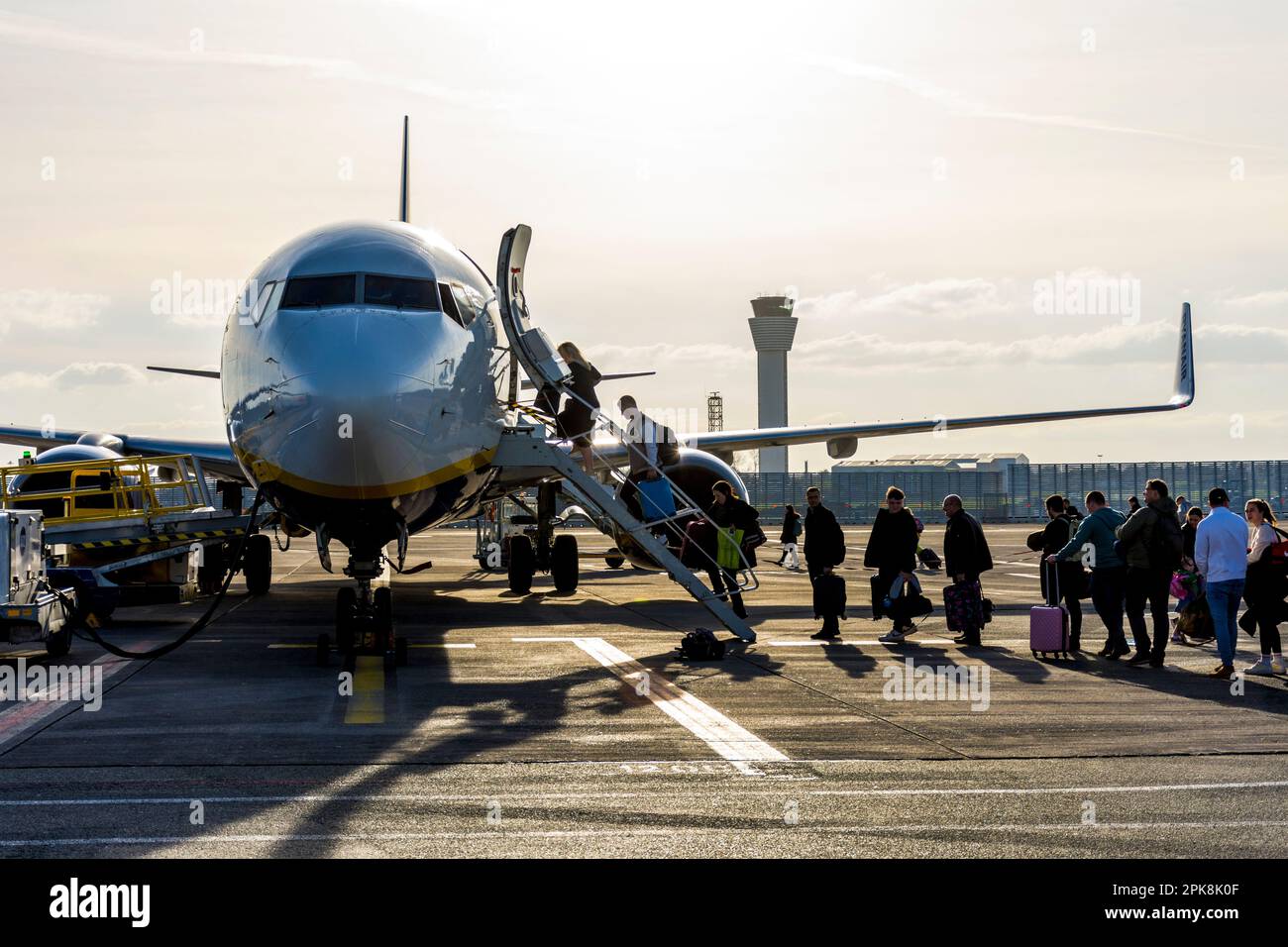 Passengers boarding a Ryanair aircraft for a flight from Dublin Airport, Ireland. Stock Photo