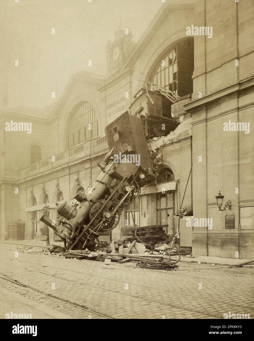 The Montparnasse station accident 1895 Paris ( The Granville Express locomotive fell vertically on the station square on October 22, 1895. The woman who died that day was the wife of the newspaper vendor she was helping. Stock Photo
