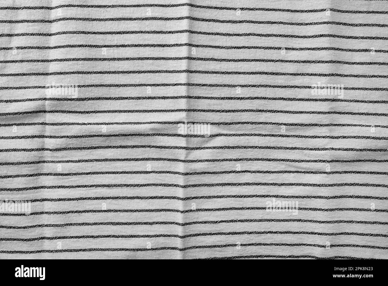 Classic black and white striped kitchen towel texture. Fabric textile
