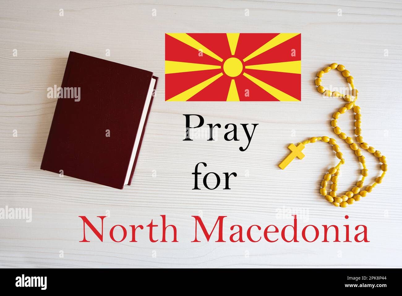 Pray for North Macedonia. Rosary and Holy Bible background Stock Photo