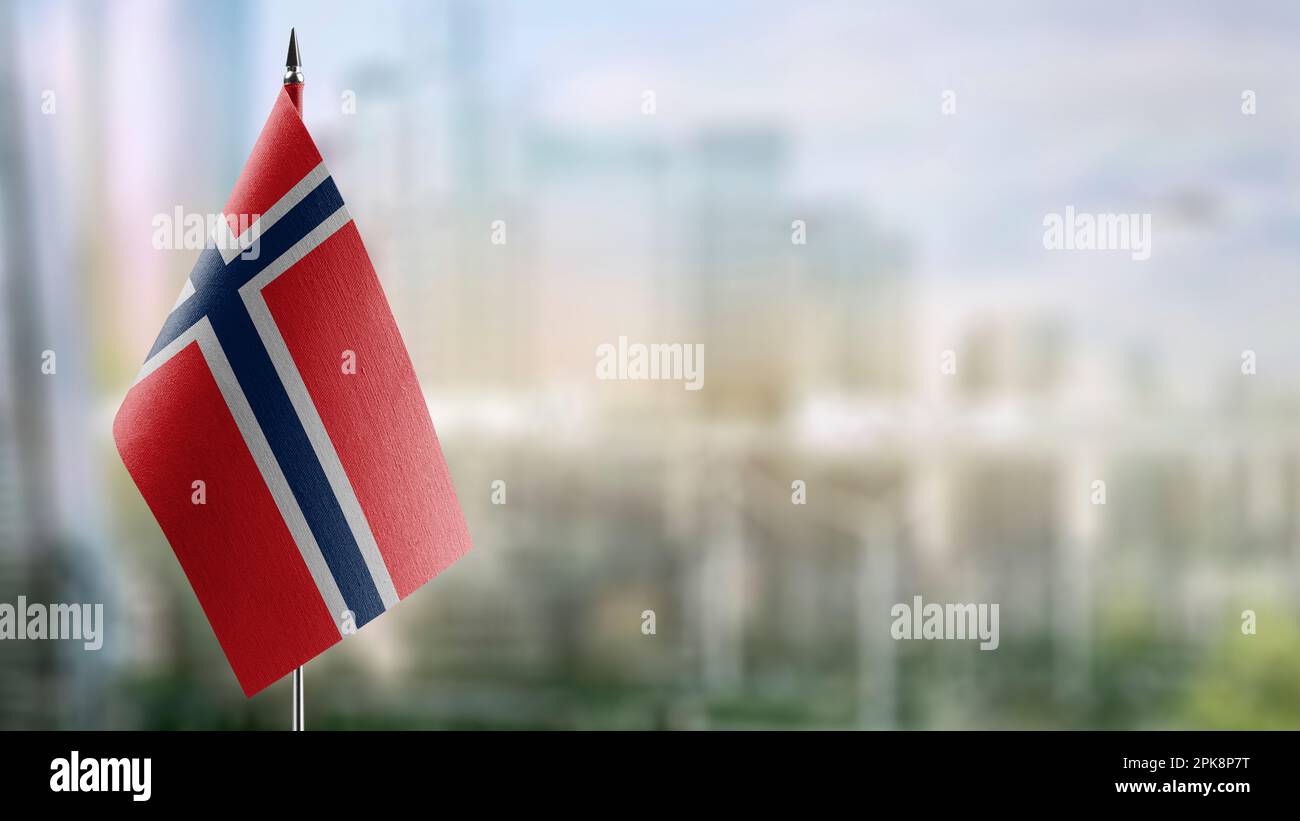 Small flags of the Norway on an abstract blurry background Stock Photo ...