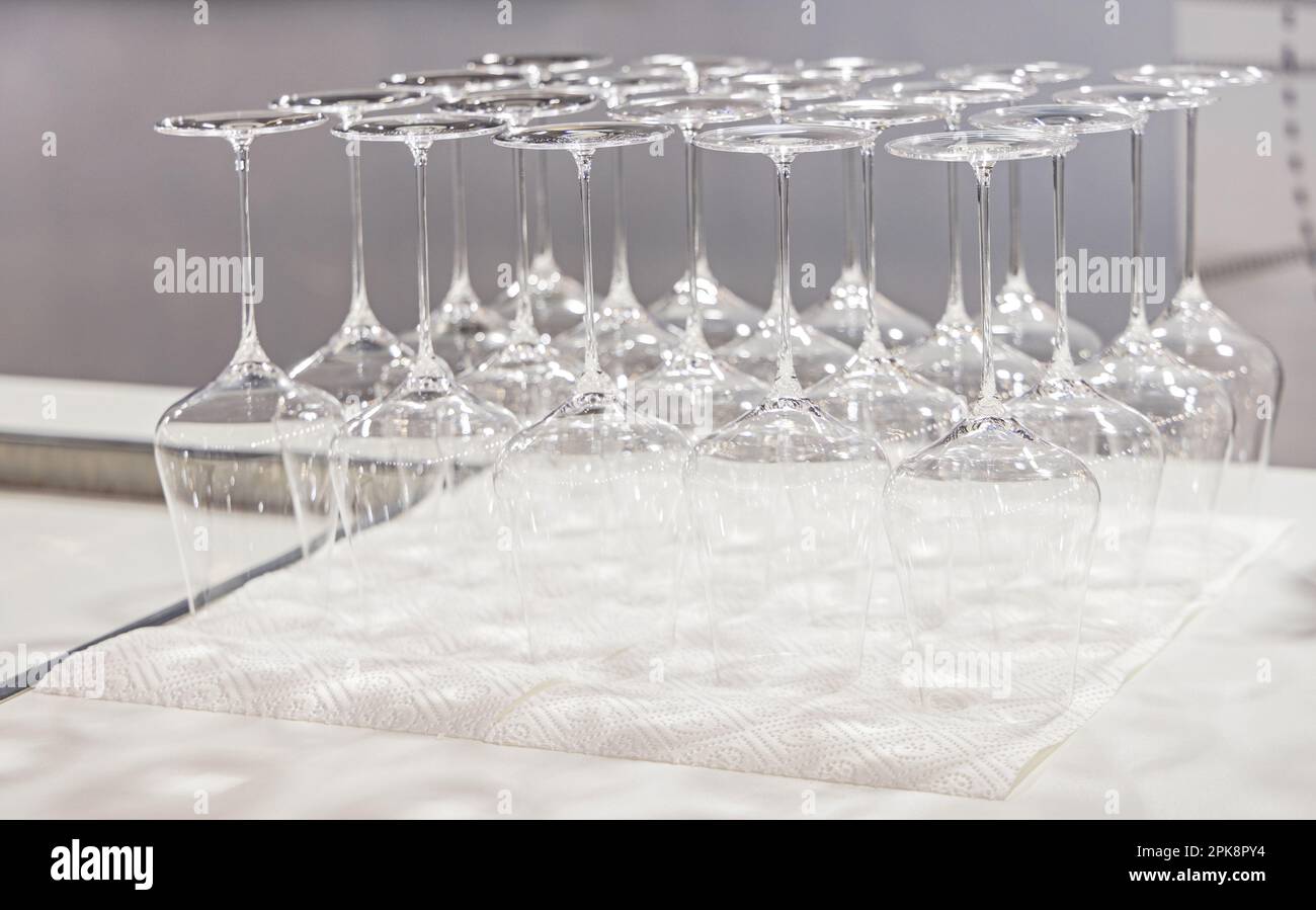 WIne Glasses Upside Down Drying at Paper Towel Stock Photo Alamy