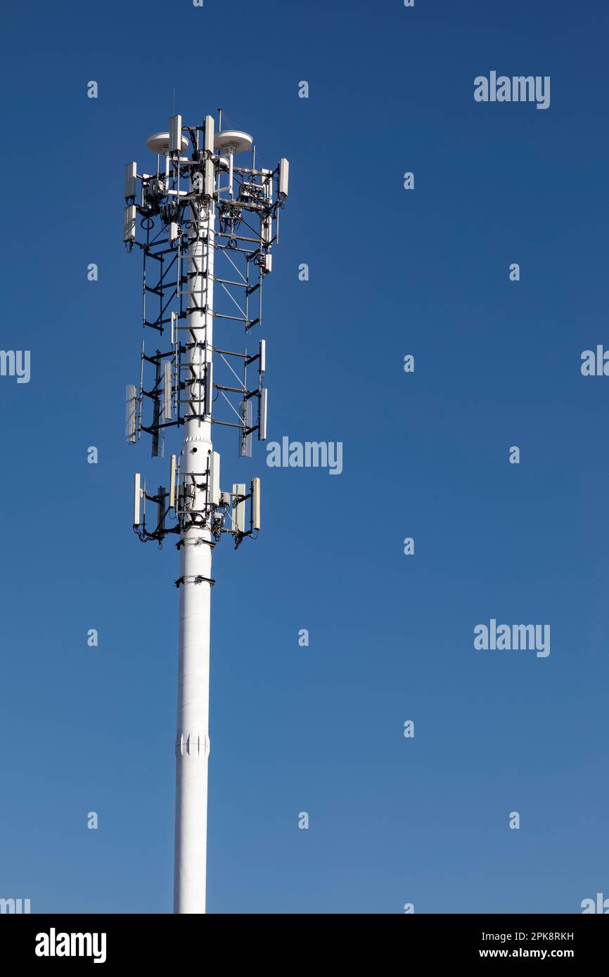 Cell phone tower in field Stock Photo Alamy