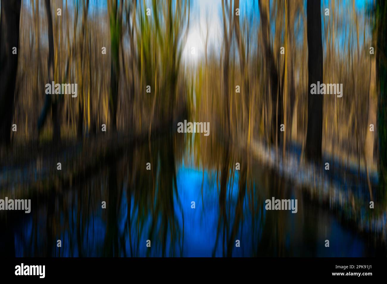 Abstract river landscape in winter in a forest Stock Photo