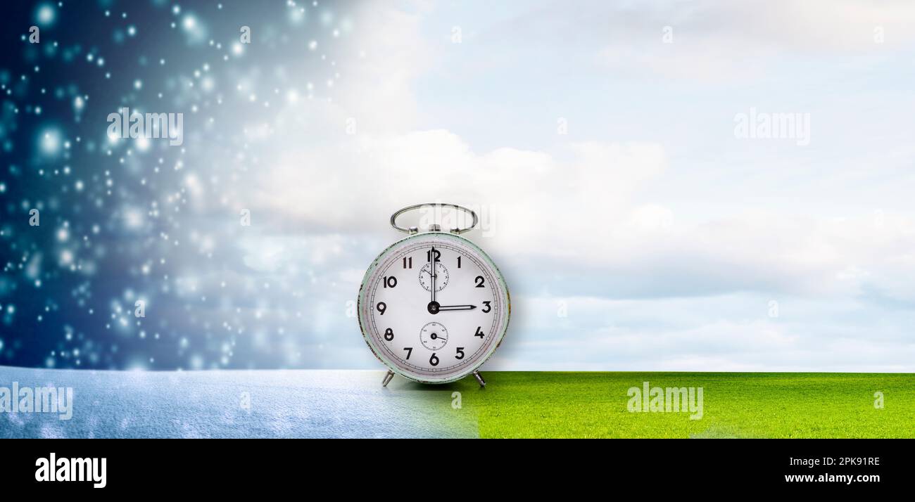 Clock, dial shows three o'clock, symbol for time change to daylight