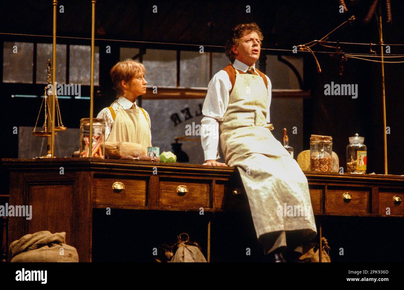 Felicity Kendal (Christopher), Ray Brooks (Weinberl) in ON THE RAZZLE by Tom Stoppard at the Lyttelton Theatre, National Theatre (NT), London SE1  22/09/1981  adapted from 'Einen Jux will er sich machen' by Johann Nestroy  design: Carl Toms  lighting: Robert Bryan  director: Peter Wood Stock Photo