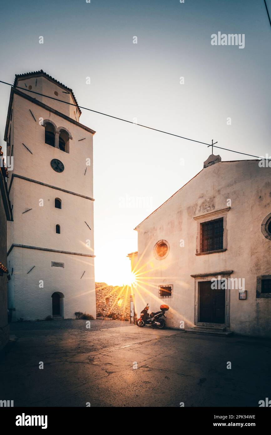 Beautiful small Croatian church in the village of Brsec, the Church of St. Mary Magdalene on a cliff above the sea in Istria, Croatia at sunrise Stock Photo