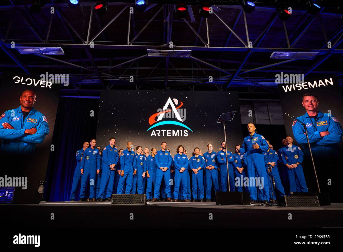 Artemis II Crew stands with members of the NASA Astronaut Corps and chief astronaut, Joe Acaba at announcement event in Houston, U.S.A. 3 April 2023 Stock Photo
