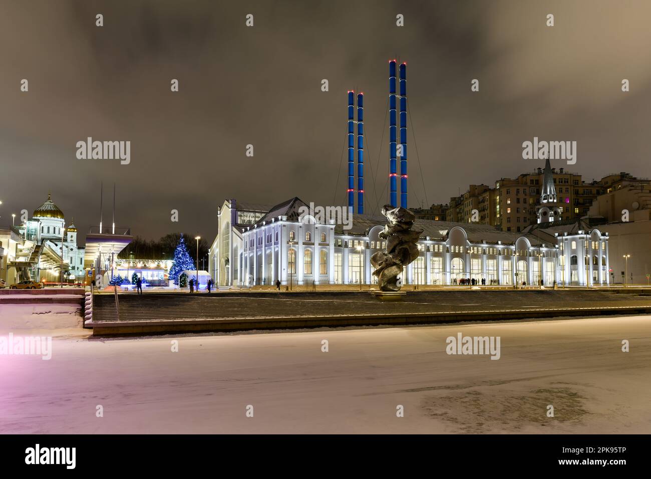 Night city landscape with a view of the House of Culture "GES-2" during a winter night in Moscow, Russia. Stock Photo