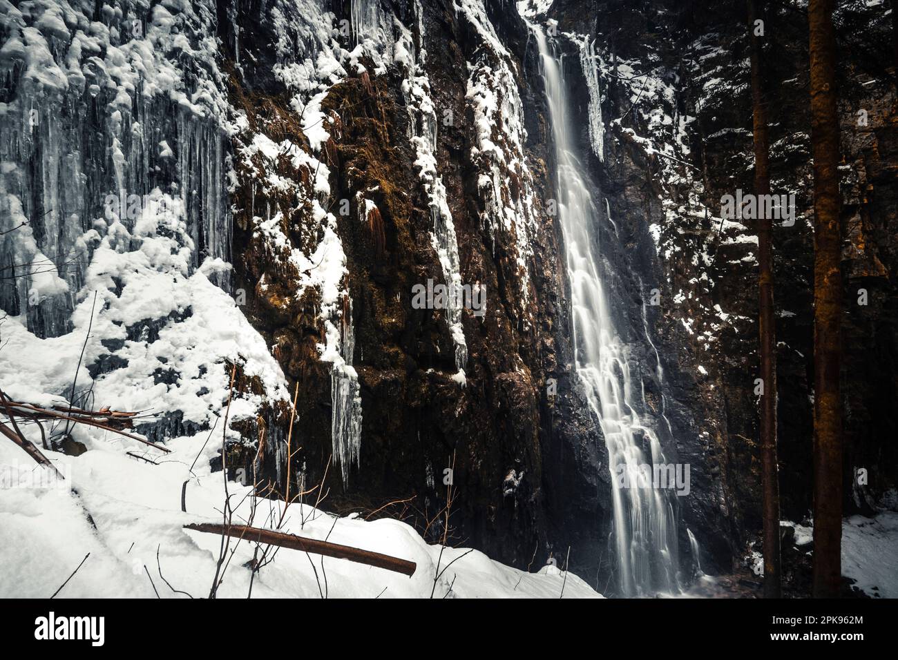The Burgbach waterfall in Bad Rippoldsau-Schapbach, Black Forest, beautiful winter landscape with snow and ice Stock Photo