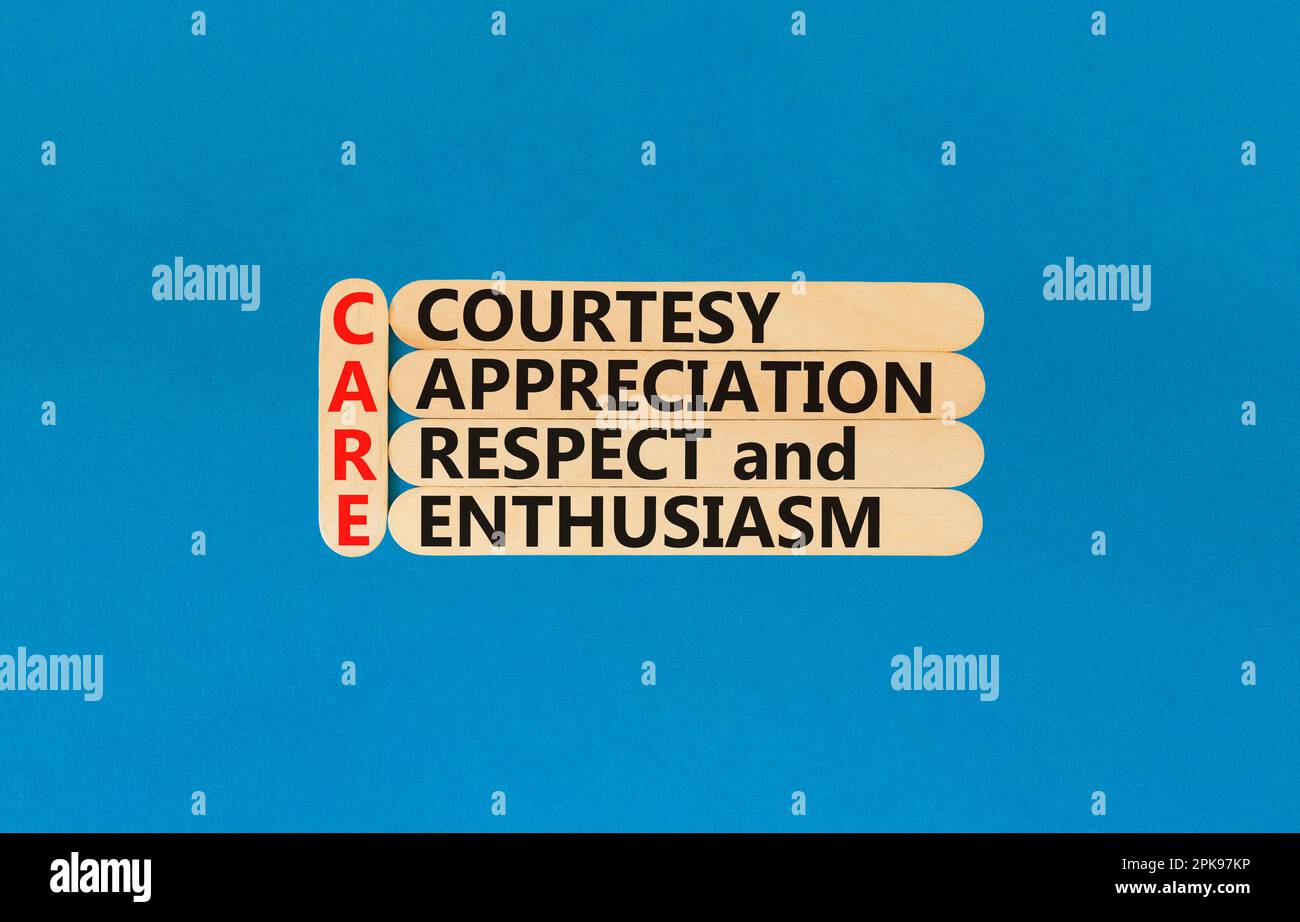 CARE symbol. Concept words CARE courtesy appreciation respect and enthusiasm on wooden stick on beautiful blue background. Business CARE courtesy appr Stock Photo