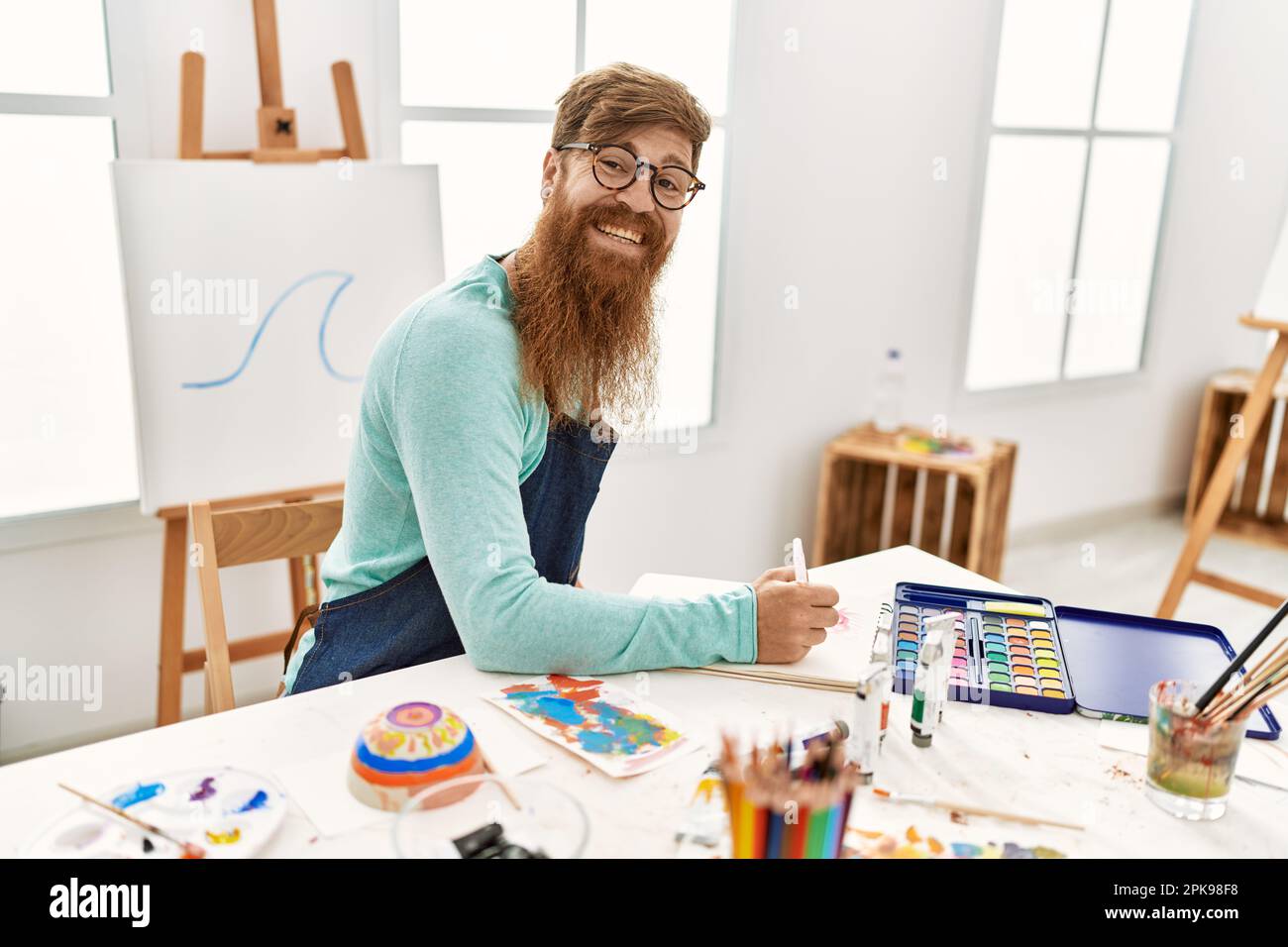 Smiling redhead man painting hi-res stock photography and images - Alamy