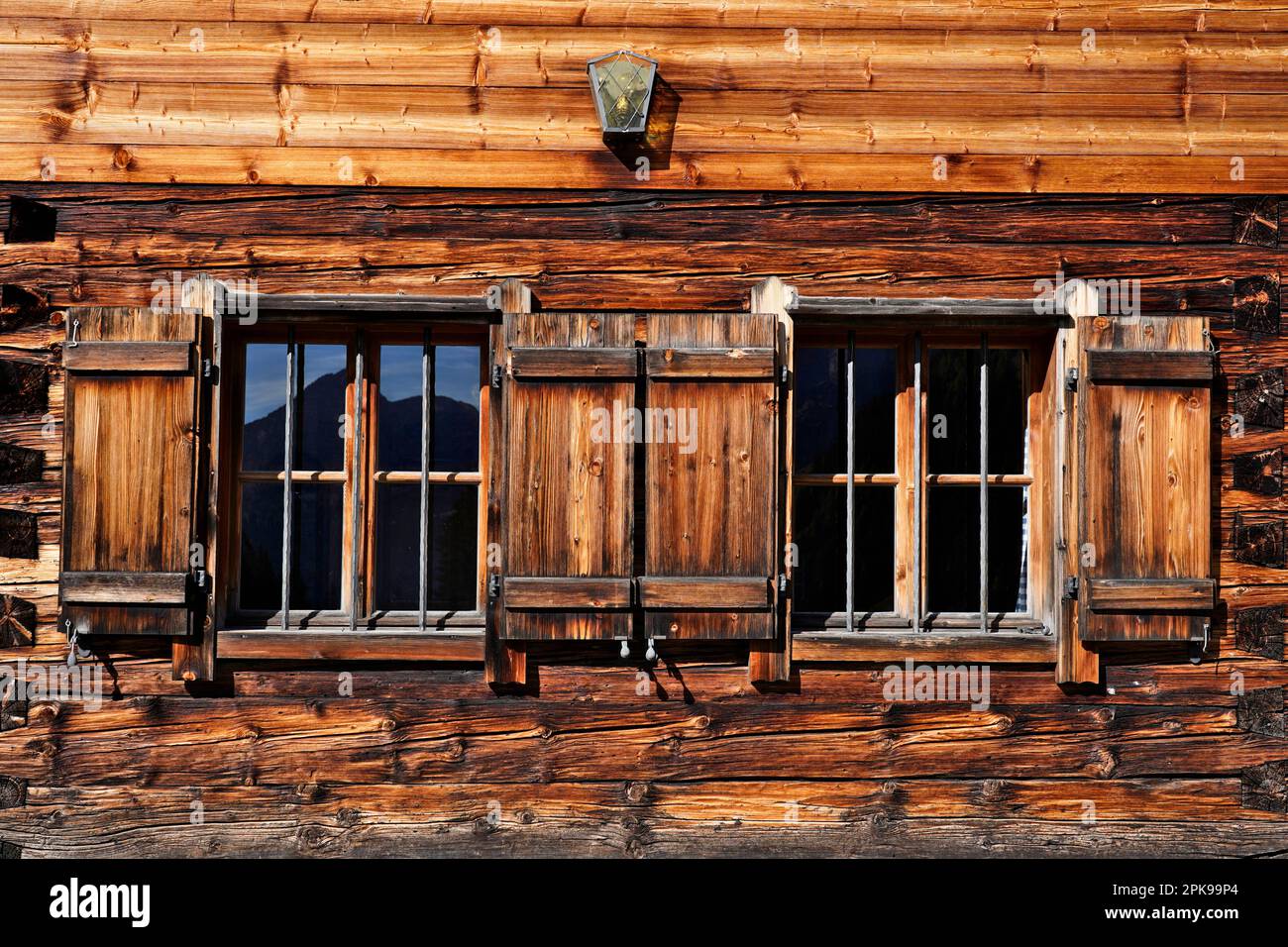 Austria, Land Salzburg, Pinzgau, Weißbach nature park, Hirschbichl, Litzlalm, mountain hut, wooden construction, two windows with shutters Stock Photo
