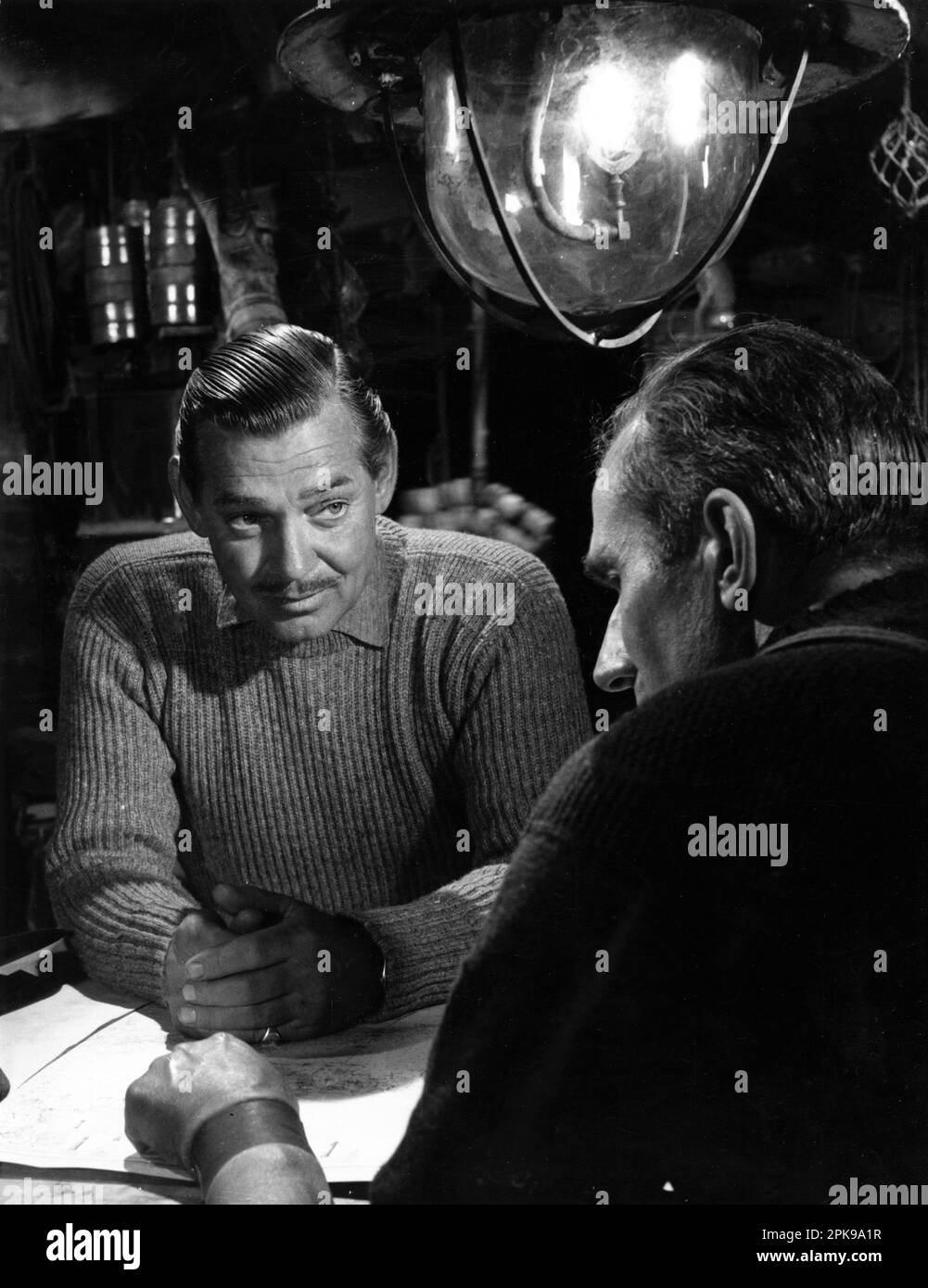 CLARK GABLE and BERNARD MILES in NEVER LET ME GO 1953 director DELMER DAVES from novel Come The Dawn by Paul Winterton producer Clarence Brown Metro Goldwyn Mayer Stock Photo