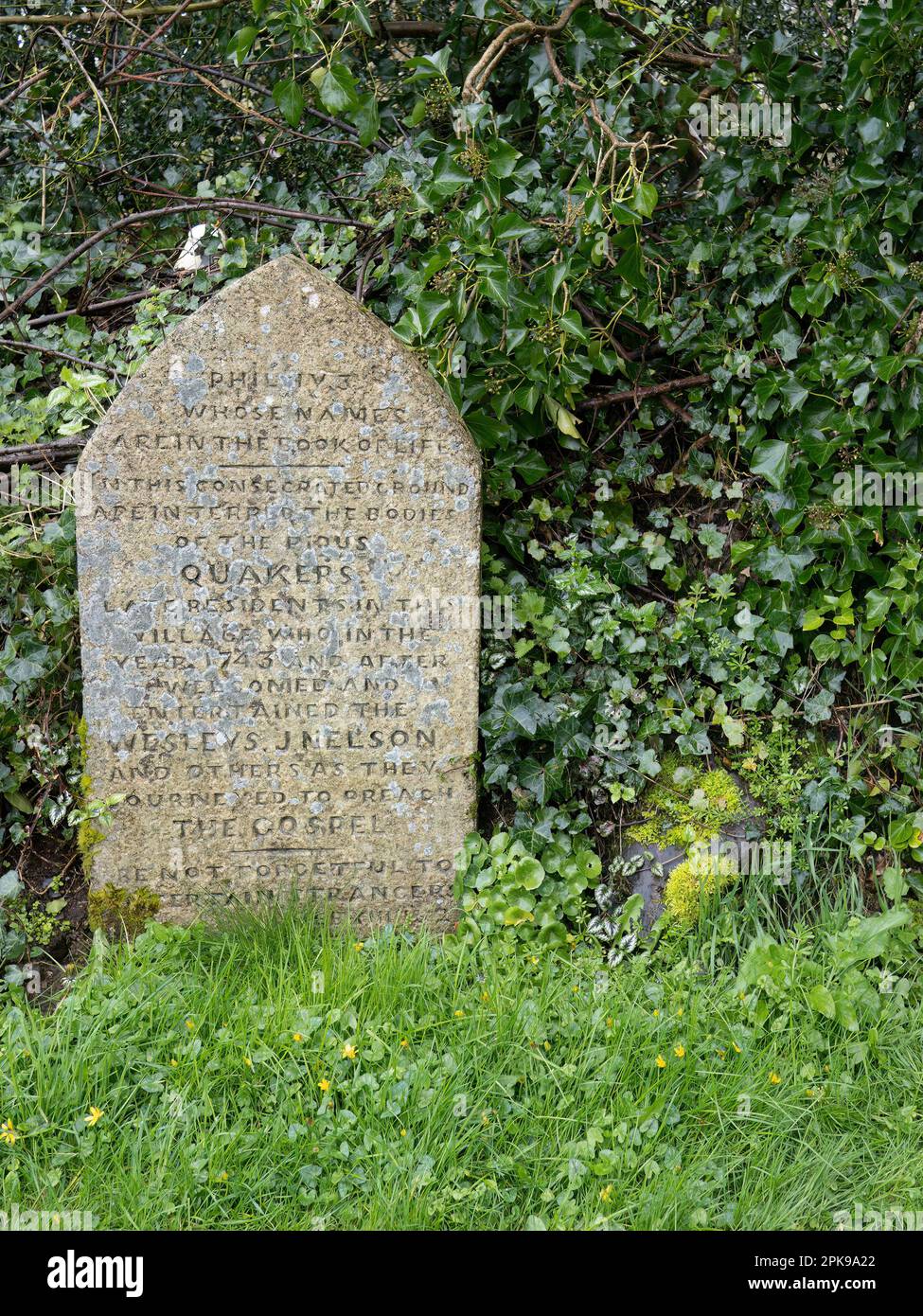 STICKLEPATH, DEVON, ENGLAND - MARCH 30 2023: Ancient stone in the Quaker graveyard. Stock Photo
