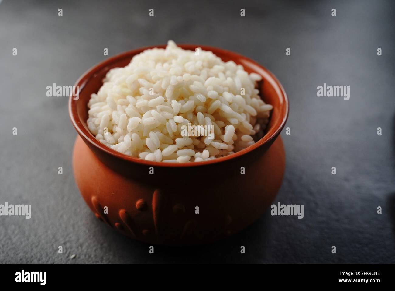 Kerala cooked white boiled rice served in earthen pot, selective focus