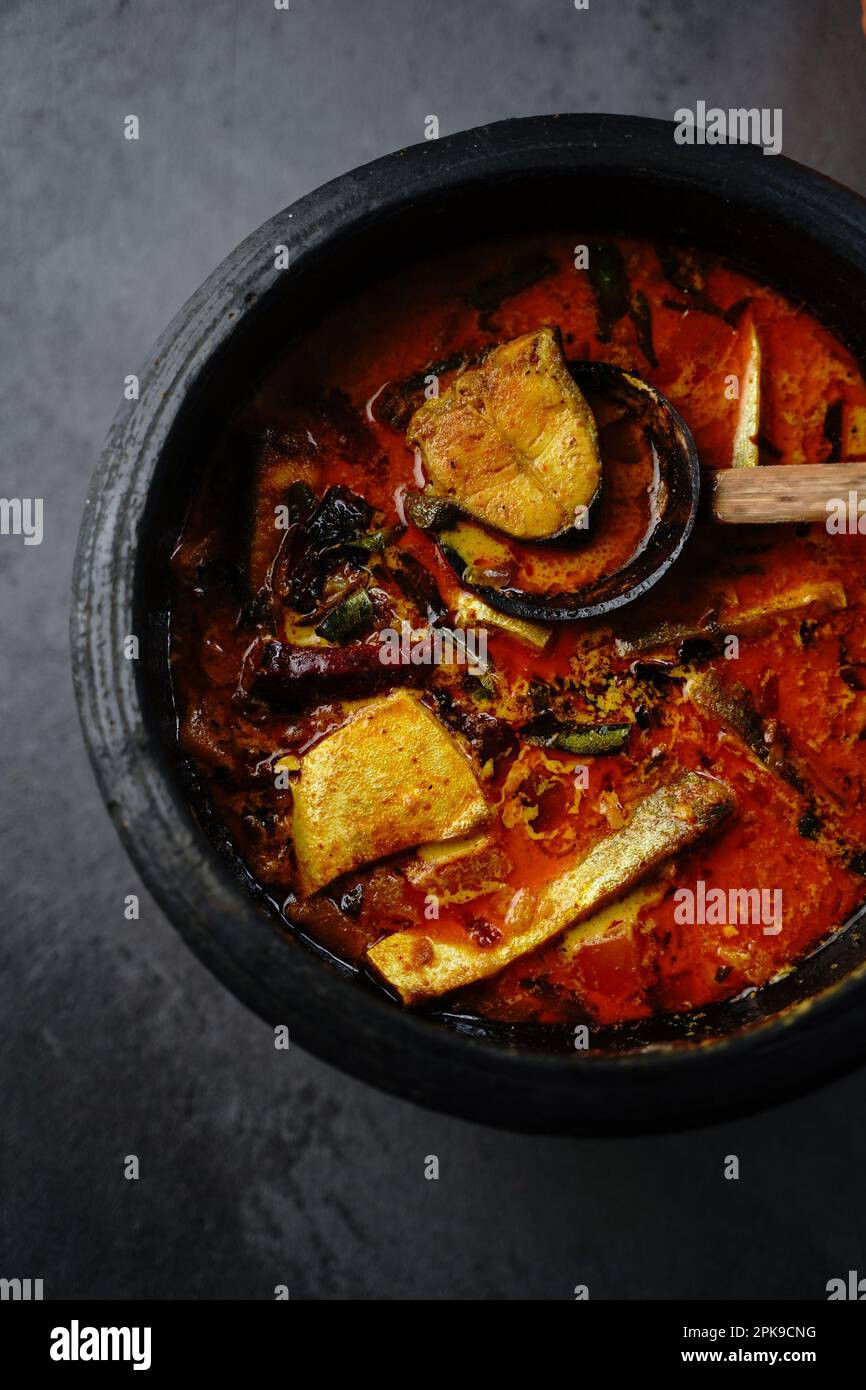 Homemade Kerala fish curry served with boiled rice Stock Photo