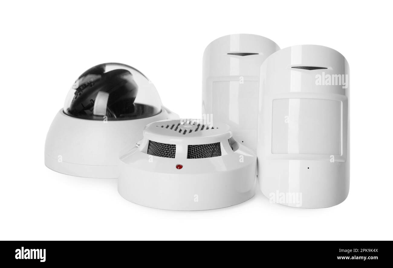 CCTV camera, smoke and movement detectors on white background. Home