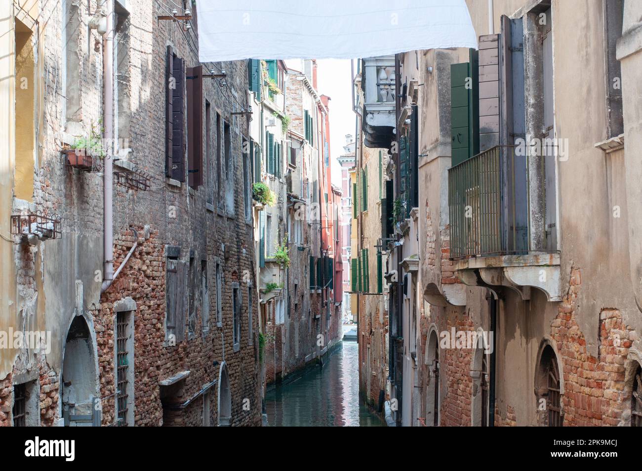 Narrow canal and architectural exteriors, Venice, Italy Stock Photo