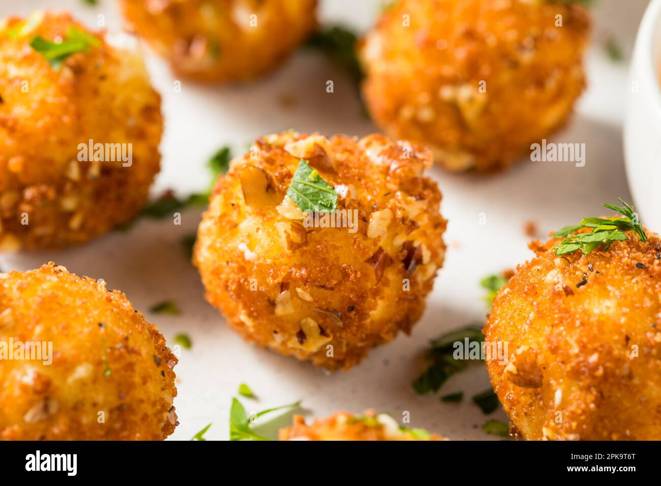 Deep Fried Goat Cheese Balls Appetizer with Dipping Sauce Stock Photo ...