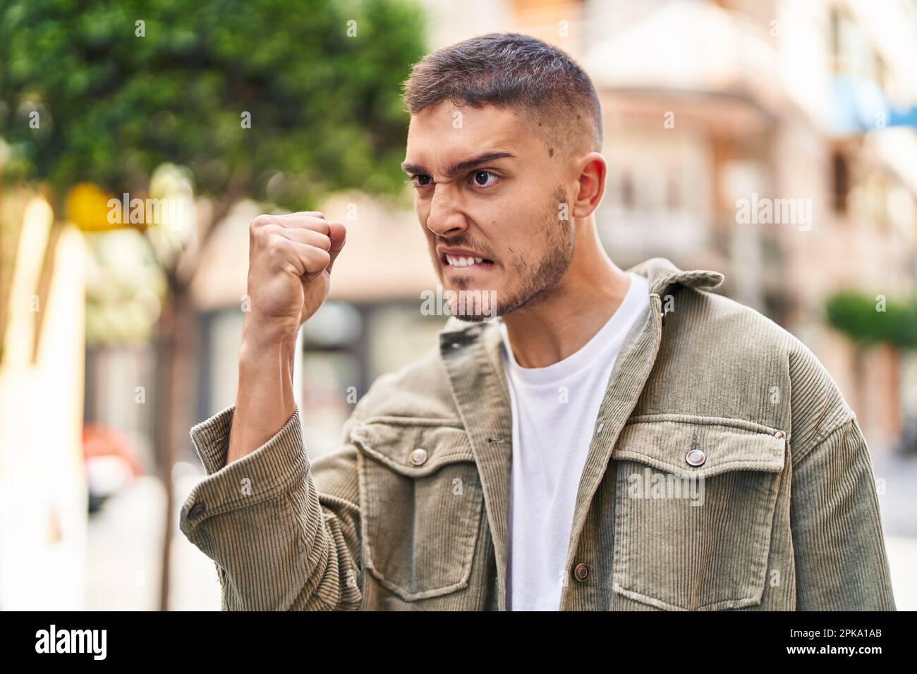 Man angry fist outside hi-res stock photography and images - Alamy