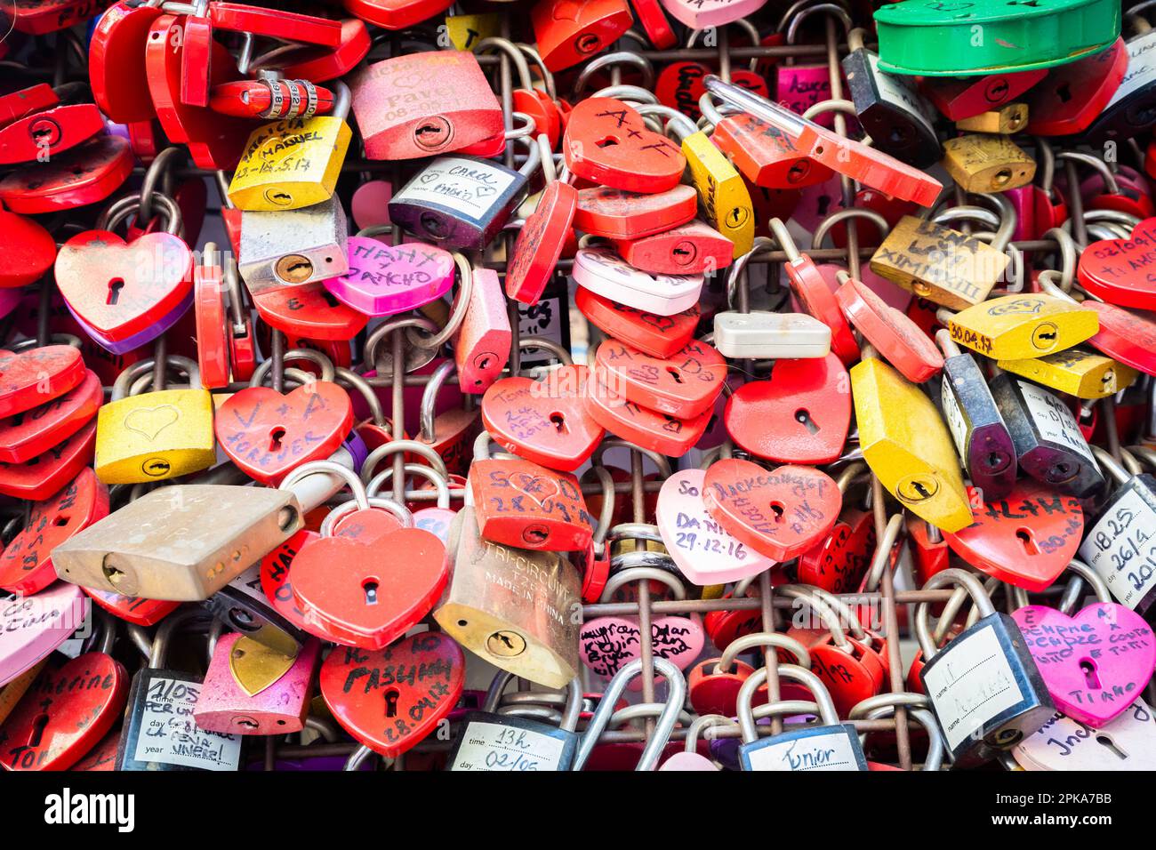 Verona, Italy - June 2022: background of heart-shaped locks on a wall ...