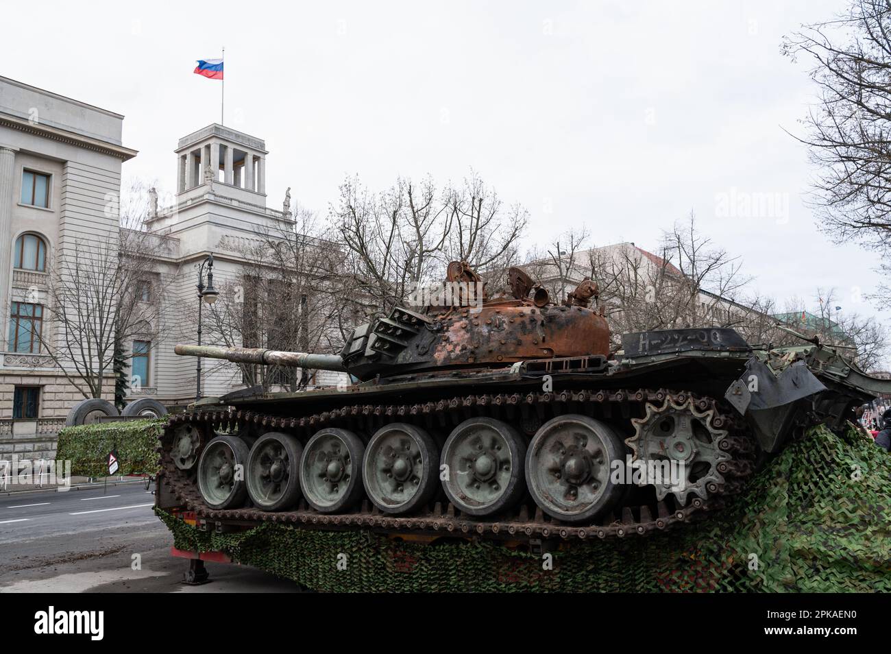 24.02.2023, Germany, , Berlin - Europe - The Russian T-72B tank destroyed by an anti-tank mine on the boulevard Unter den Linden just in front of the Stock Photo
